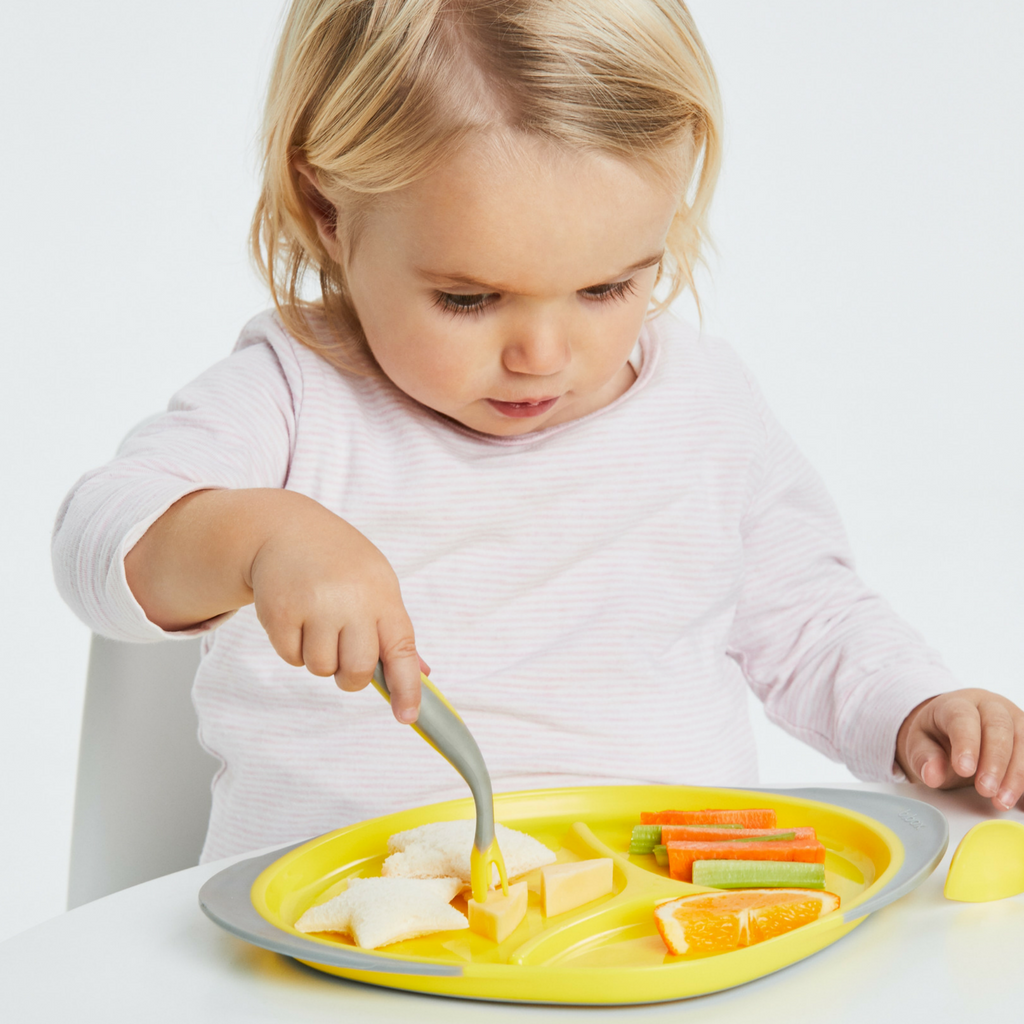 child with Toddler cutlery set - lemon sherbet - b.box for kids