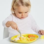 child with Toddler cutlery set - lemon sherbet - b.box for kids
