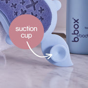 Baby Bath Brush Suction Cup standing next to b.box body Cleanse Hair + Body Wash