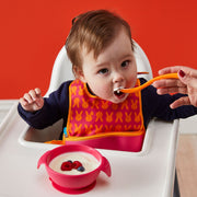 child with silicone first feeding set - strawberry shake - b.box for kids